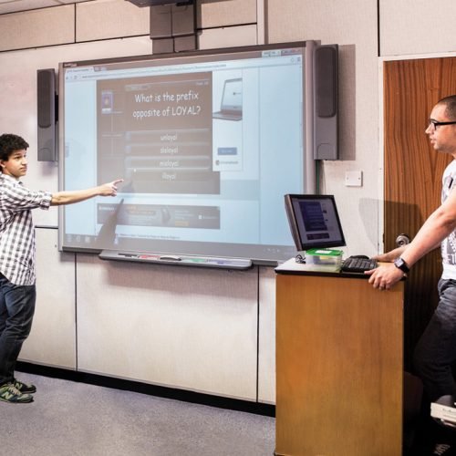 A student from Anglo continental summer school in Bournemouth is presenting a presentation.